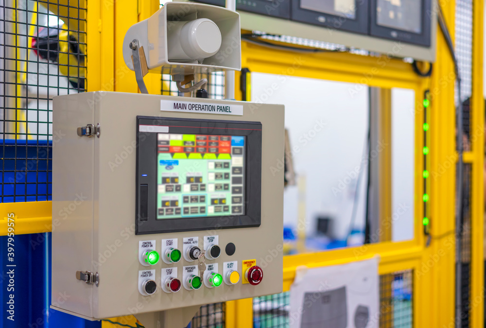 Wall mural factory 4.0 concept : view of operation panel and product inspection monitoring display on fence of 