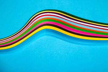 Abstract composition with a figure from colored paper