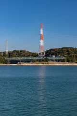 Fototapeta na wymiar 海岸の送電塔の風景