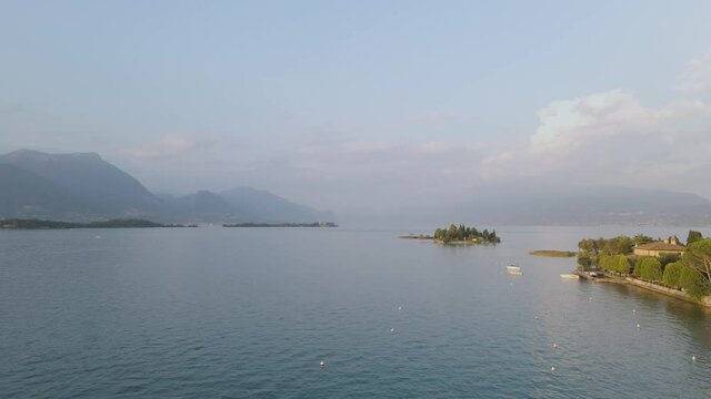 Aerial view on cost of Lake Garda and San Biagio Island by Manerba town, Italy