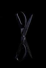 scissors on a black background
