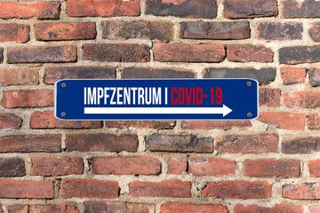 Obraz premium Schild und Hinweis auf Impfung Corona Covid-19