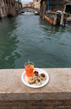 Cicchetti and Aperol Spritz traditional venetian food and drink