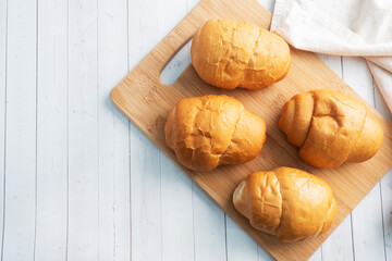 Fresh wheat bread rolls. Rolls for a hot dog or hamburger. White background copy space.