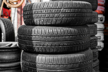 Obraz premium old motor vehicle car tyres