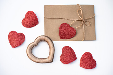 One envelope with many red heart. love Valentine day on 14th February. Send love letter, small gift, confession of love to beloved. craft envelope