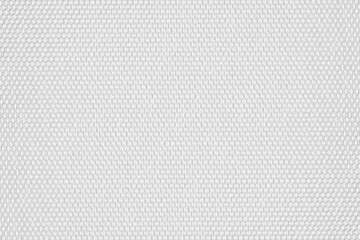 White fabric background. White canvas texture. Bright textile material background. Soft fiber closeup. Simple white surface. Geometrical pattern.