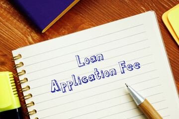 Business concept meaning Loan Application Fee with inscription on the sheet.