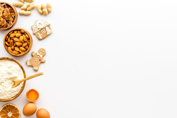 Cooking background with icing gingerbread cookies for Christmas, top view