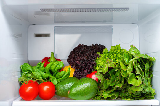 Fridge Shelf Full Of Fresh Vegetables Close Up