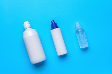 Contact lenses solutions on color background