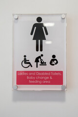 Ladies public toilet sign for restroom, disabled toilets, baby changing and feeding area on white...