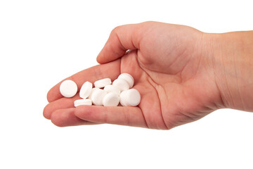Fototapeta na wymiar White pills for health care in hand isolated on the white