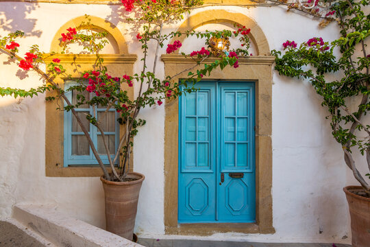 Fototapeta Colorful street of Skala Village in Patmos Island