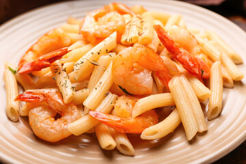 Plate of tasty pasta with shrimps, closeup