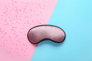 Sleep mask on color background