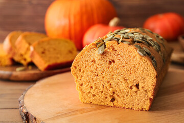Tasty pumpkin pie on table