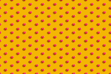 Valentine Day. Orange seamless background. Red heart pattern. Romantic congratulation. Love symbol ornament minimalist symmetrical composition isolated on bright yellow.