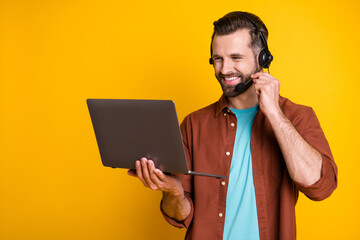 Photo portrait of call center worker talking in earphones with microphone laptop smiling copyspace...
