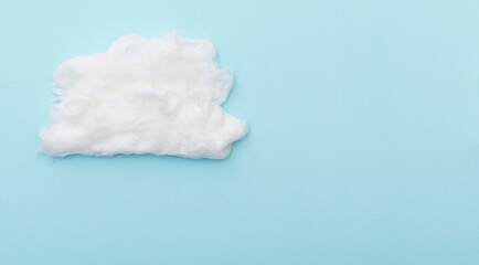 Cumulus clouds by cotton wool on blue surface, layout for ideas, space for text