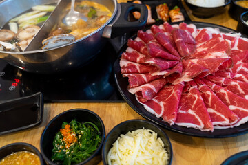 many Sliced beef served as a set For hotpot or sukiyaki