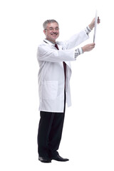 smiling doctor looking at the patient's x-ray . isolated on a white background