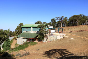 Obraz premium Ski lifts summer. Cable-car gondola station in summer. Troodos Mountains in Cyprus