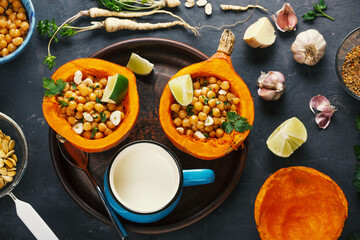 baked hokkaido pumpkin with chickpeas with chickpeas diet food. top view