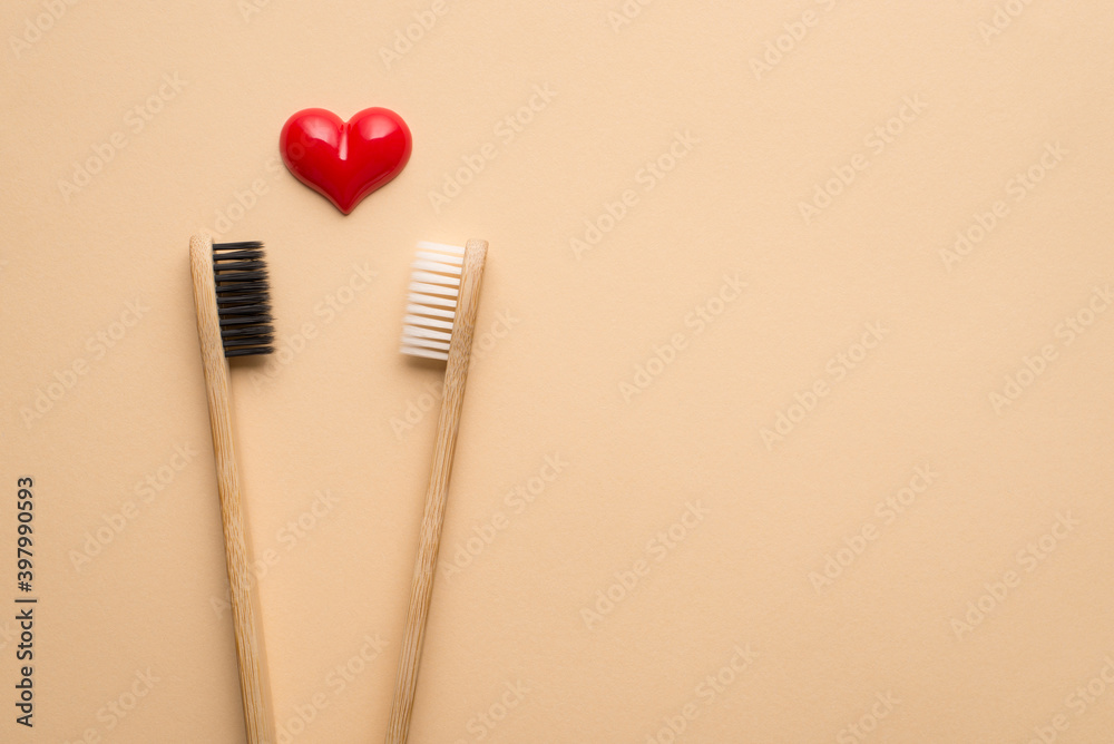 Wall mural valentines day concept. top above close up view photo of two bamboo eco-friendly wooden toothbrushes