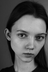 Close-up emotional portrait of young woman