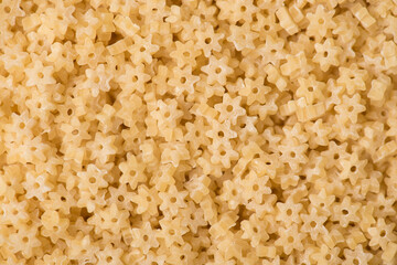 Close up top above overhead view image of mini macaroni in shape of stars