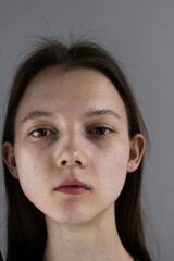 Close-up emotional portrait of young woman
