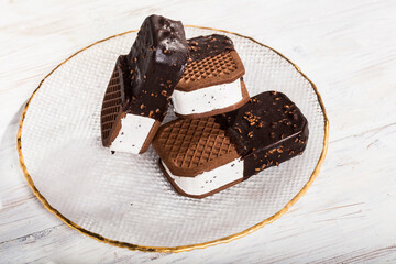 ice cream biscuit with dark chocolate and grains