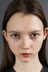 Close-up emotional portrait of young woman