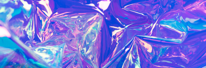Fototapeta na wymiar Purple pearlescent blurred hologram banner. Crumpled foil material. Fluid shiny abstract texture.