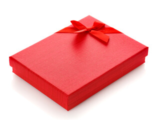 Red gift box with red ribbon bow isolated on white background. Side view.