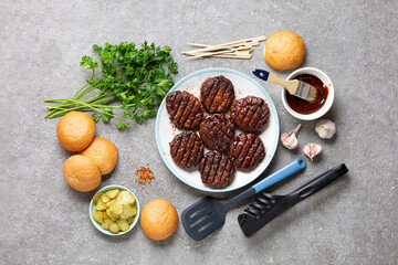 Ingredients for Cooking Meat Burger close up on stone background, top view