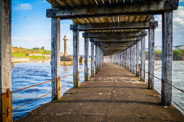 Pier and lighthouse of Whitby,  Yorkshire,  United Kingdom