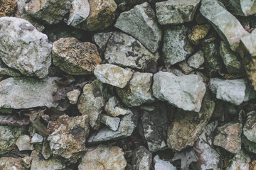 Texture of the stones. Stones on the road. A lot of bog stones