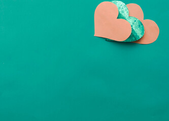 Background pink and blue hearts and on blue, copy space