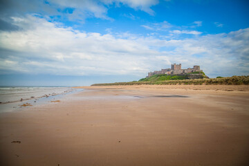 Bamburgh Castle on the beach of Northumberland,  United Kingdom