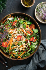 Winter Salad made with vegetables and sprouted chickpeas and buckwheat