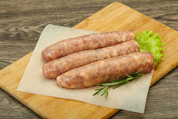 Raw pork meat sausages for grill