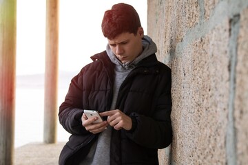 frustrated and sad man talking on the mobile phone