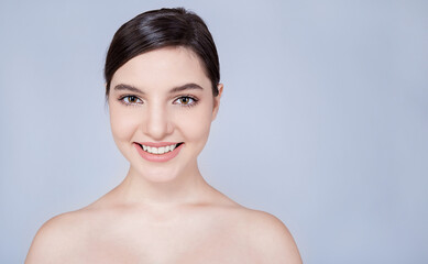 Closeup portrait of beauty caucasian woman with fair perfect healthy glow skin bear shoulder copy space, young beautiful latin arab girl with pretty smile on face. Beauty clinic skincare concept