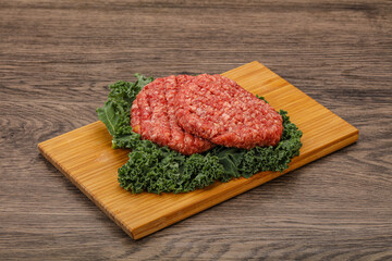Raw beef burger cutlet for cooking