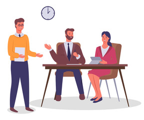 Business meeting and consideration of working issues. Office workers discussing matters. Businessmen dressed in formal clothes in the modern office interior sitting at a table. Friendly team work