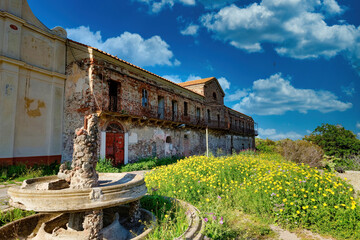 Military architecture and wildflowers of the island of Capraia in the Tuscan Archipelago of Italy