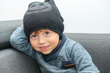 portrait of young child with a winter hat