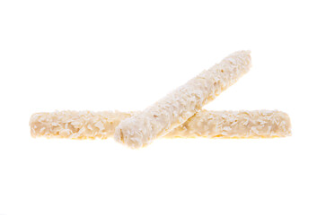 wafer rolls with coconut flakes isolated